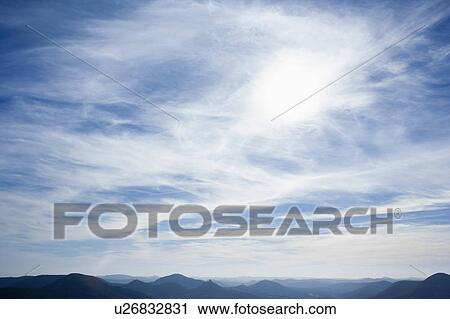 Blue sky with clouds View Large Photo Image Stock Image - Blue sky with clouds. Fotosearch