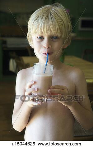 Stock Photography - Boy drinking smoothie. Fotosearch