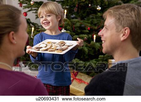 boy presents plate of homemade biscuits View Large Photo Image Stock Image - boy presents plate of homemade biscuits. Fotosearch