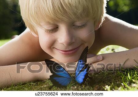 Boy with Butterfly View Large Photo Image Picture - Boy with Butterfly. Fotosearch