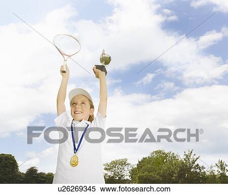 Boy with tennis racket and trophy View Large Photo Image Stock Photography - Boy with tennis racket and trophy. Fotosearch