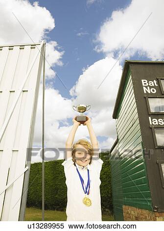 Boy with Trophy and medals View Large Photo Image Stock Photography - Boy with Trophy and medals. Fotosearch