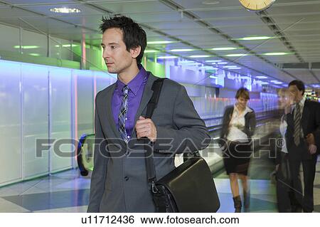 business man at airport, walking View Large Photo Image Stock Photograph - business man at airport, walking. Fotosearch