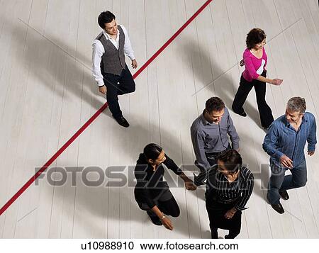 Business men and women crossing red line View Large Photo Image Stock Image - Business men and women crossing red line. Fotosearch