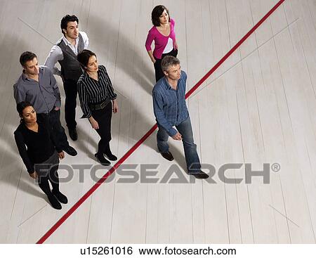 Business men and women crossing red line View Large Photo Image Stock Photograph - Business men and women crossing red line. Fotosearch