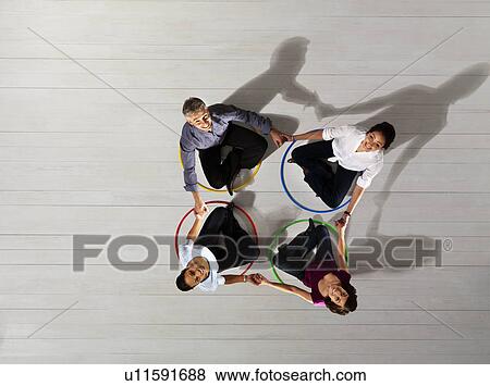 Business men and women in circles View Large Photo Image Stock Photo - Business men and women in circles. Fotosearch