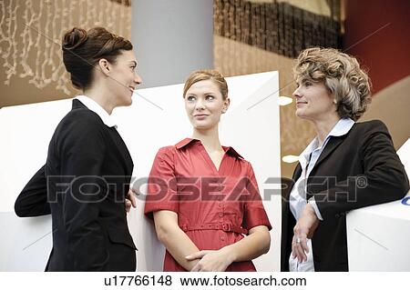 Business people having informal meeting View Large Photo Image Stock Photo - Business people having informal meeting. Fotosearch