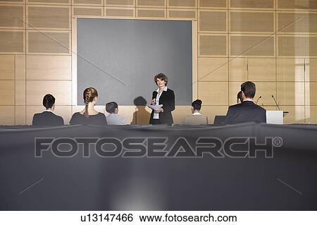 Business people in seminar View Large Photo Image Stock Photograph - Business people in seminar. Fotosearch