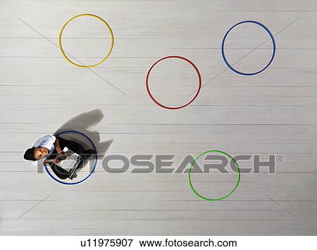 Stock Photo - Business women sitting in circle. Fotosearch