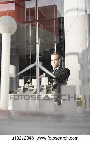 Businessman looking at an architectural View Large Photo Image Stock Photograph - Businessman looking at an architectural. Fotosearch