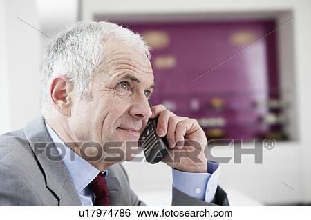 Stock Photograph - Businessman phoning. Fotosearch