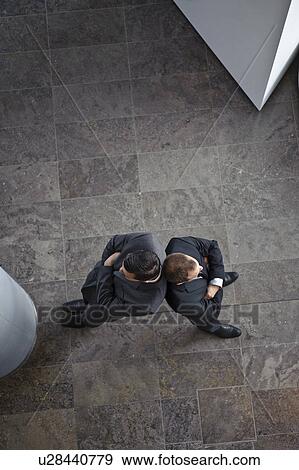 Businessmen leaning backward View Large Photo Image Stock Photo - Businessmen leaning backward. Fotosearch