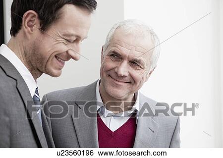 Stock Photograph - Businessmen talking. Fotosearch