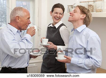 Businesspeople on a coffee break View Large Photo Image Stock Photo - Businesspeople on a coffee break. Fotosearch