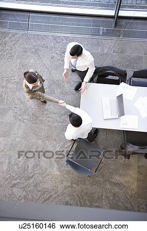 Businesspeople shaking hands View Large Photo Image Stock Photograph - Businesspeople shaking hands. Fotosearch