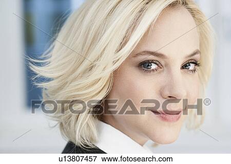 Businesswoman looking at viewer View Large Photo Image Stock Photo - Businesswoman looking at viewer. Fotosearch