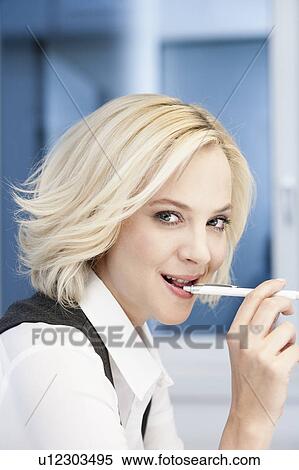Businesswoman with pen View Large Photo Image Stock Photography - Businesswoman with pen. Fotosearch
