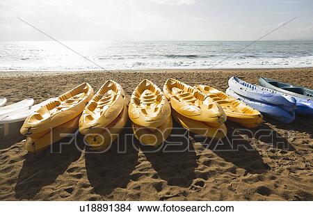 Picture - Canoes on Beach. Fotosearch