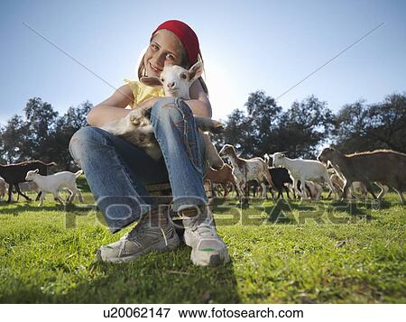 Child holding a kid View Large Photo Image Stock Photo - Child holding a kid. Fotosearch
