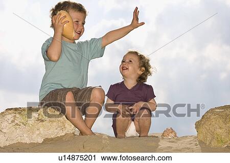 Children at the beach View Large Photo Image Stock Image - Children at the beach. Fotosearch
