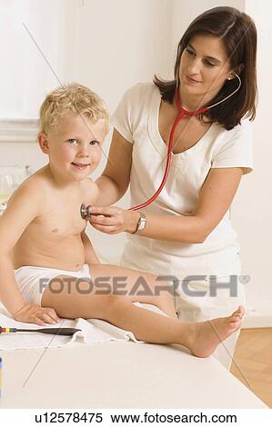 Stock Photography - Children at the pediatrician. Fotosearch