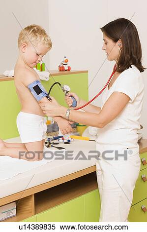 Children at the pediatrician View Large Photo Image Stock Photography - Children at the pediatrician. Fotosearch