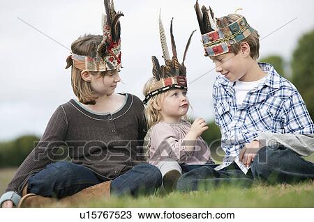 Children in Native American headgear View Large Photo Image Stock Image - Children in Native American headgear. Fotosearch