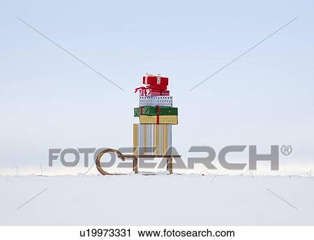 Christmas presents on sled View Large Photo Image Stock Image - Christmas presents on sled. Fotosearch