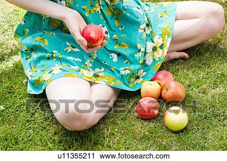 close up of girl holding apple. View Large Photo Image Stock Image - close up of girl holding apple.. Fotosearch