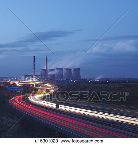 Stock Image - Coal Fired Power Station With Motorway. Fotosearch