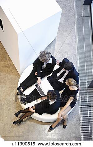 Colleagues working together on project View Large Photo Image Stock Photography - Colleagues working together on project. Fotosearch