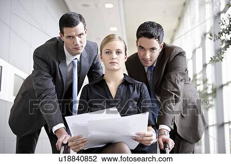 Colleagues working together View Large Photo Image Stock Image - Colleagues working together. Fotosearch