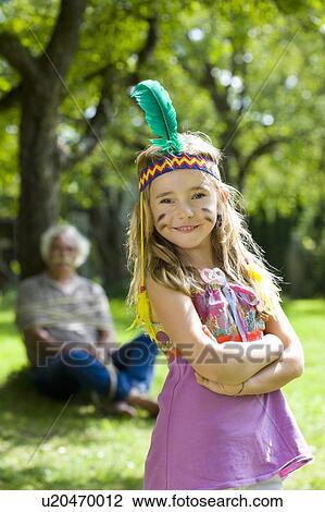 Costumed girl smiling View Large Photo Image Stock Image - Costumed girl smiling. Fotosearch