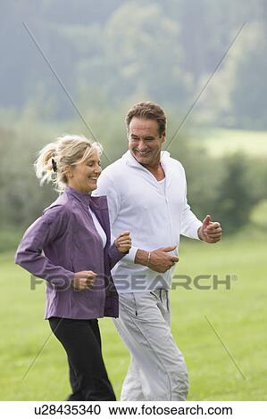 Couple doing sports View Large Photo Image Stock Image - Couple doing sports. Fotosearch