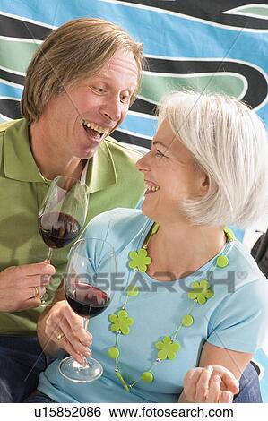 Stock Photograph - Couple drinking wine. Fotosearch