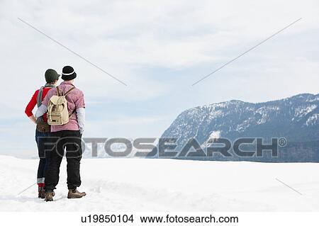 Picture - Couple enjoying panorama. Fotosearch