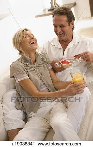 Couple having breakfast View Large Photo Image Stock Image - Couple having breakfast. Fotosearch
