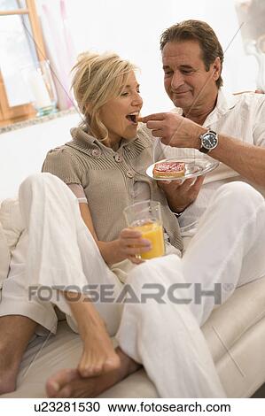 Couple having breakfast View Large Photo Image Stock Image - Couple having breakfast. Fotosearch