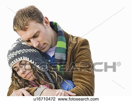 Stock Image - Couple hugging. Fotosearch