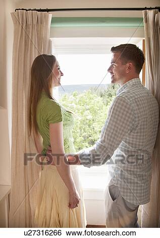 Couple in hotel room View Large Photo Image Stock Photograph - Couple in hotel room. Fotosearch