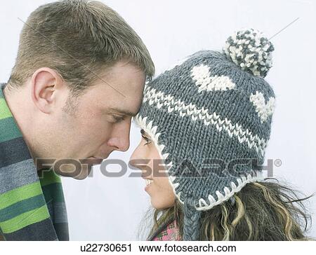 Stock Image - Couple looking each other in the eye. Fotosearch