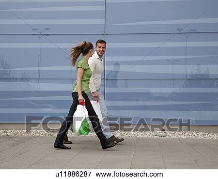 Stock Photo - Couple shopping. Fotosearch