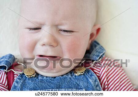 Stock Image - Crying baby-boy. Fotosearch