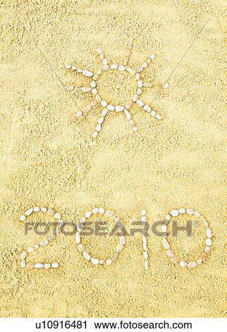 Stock Image - Date and sun in sand. Fotosearch
