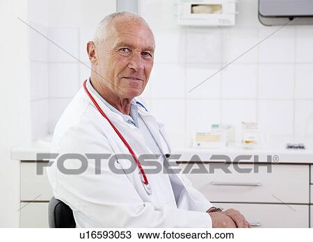 Doctor in surgery View Large Photo Image Stock Image - Doctor in surgery. Fotosearch
