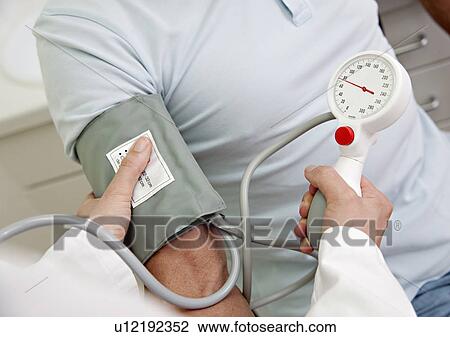 Doctor patient's taking blood pressure View Large Photo Image Stock Image - Doctor patient's taking blood pressure. Fotosearch