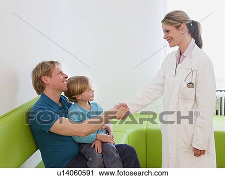 Doctor with patient in waiting area View Large Photo Image Stock Image - Doctor with patient in waiting area. Fotosearch