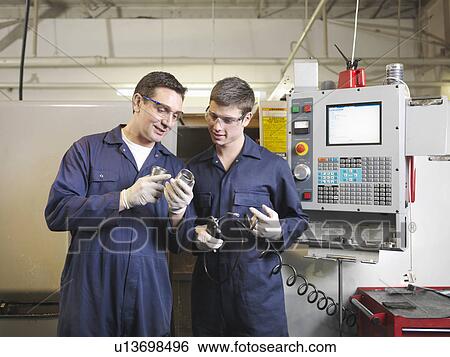Engineer & Apprentice With CNC Machine View Large Photo Image Stock Photograph - Engineer & Apprentice With CNC Machine. Fotosearch