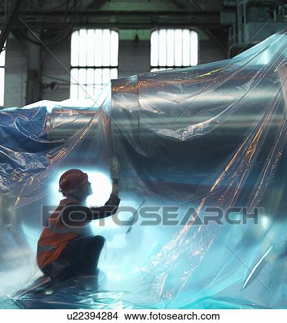 Picture - Engineer Inspecting Steel For Dispatch. Fotosearch