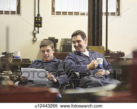Engineer Relaxing With Apprentice View Large Photo Image Stock Photography - Engineer Relaxing With Apprentice. Fotosearch
